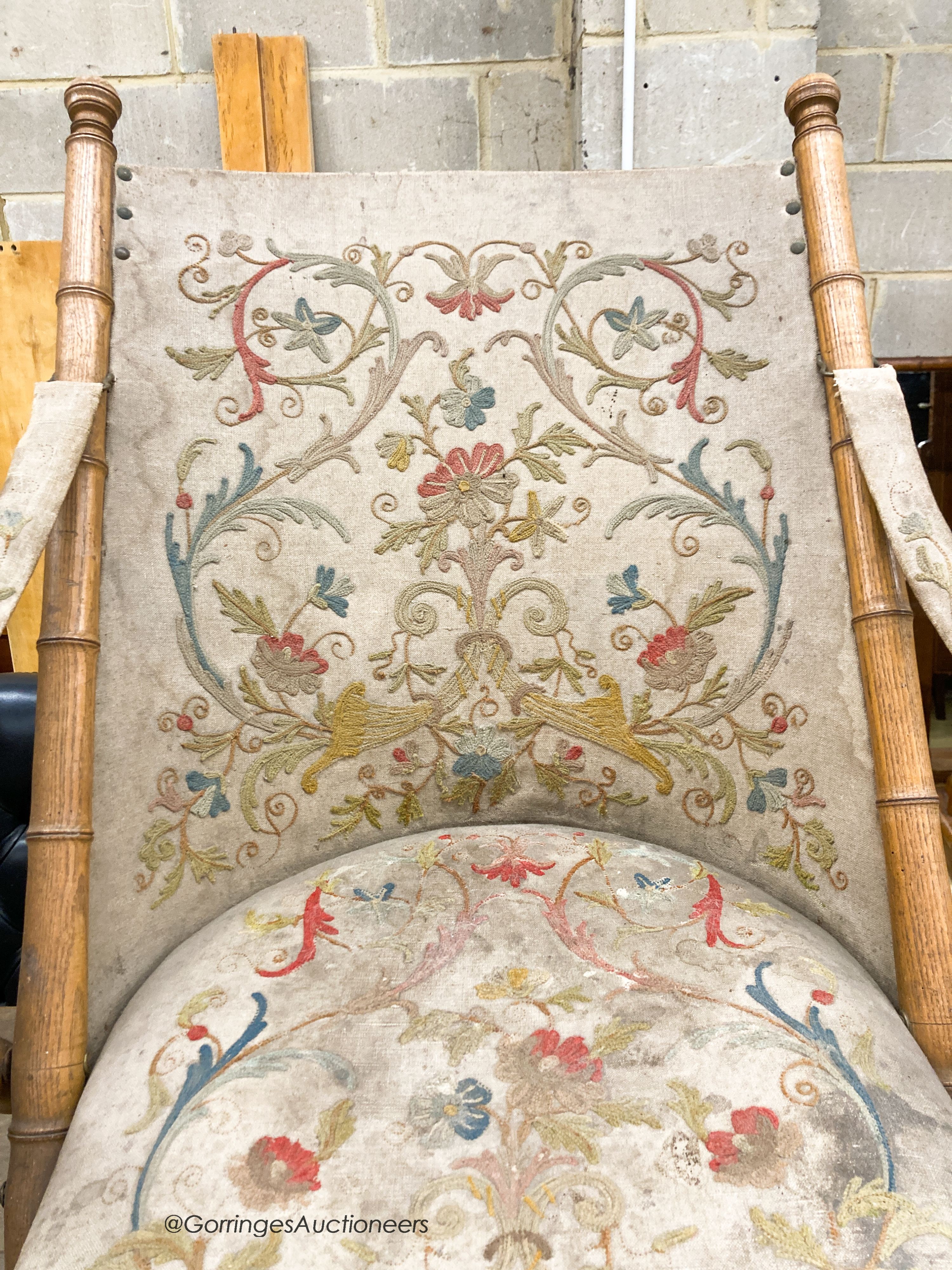 A Victorian faux bamboo folding chair with tapestry upholstery, W.66cm D.50cm H.90cm